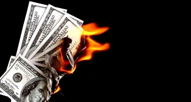 burning dollars